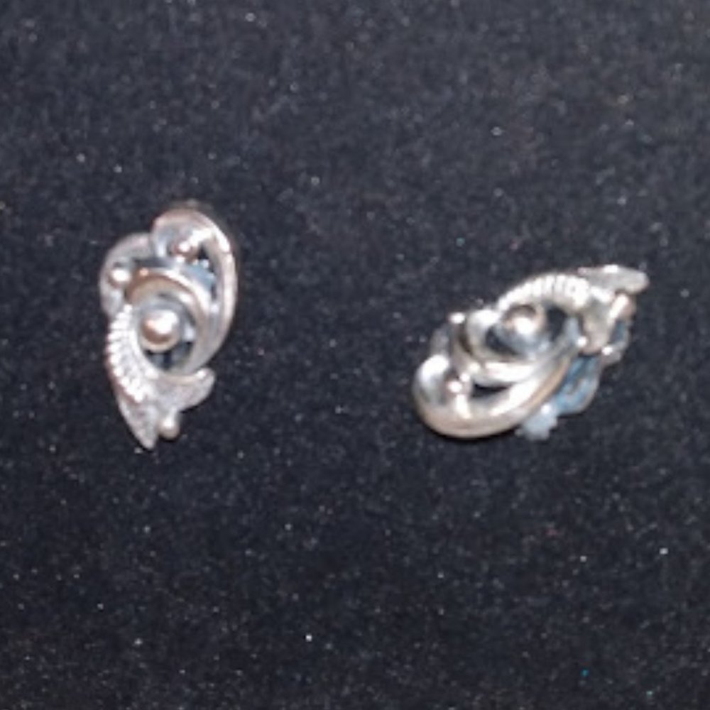 Botticelli: Silver tone Clip earrings